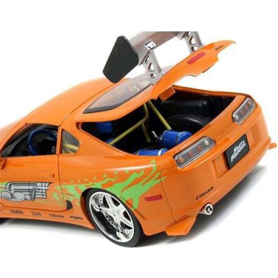 Fast & Furious: 1995 Toyota Supra with Figure Brian with Light-Up Function Diecast Model 1/18