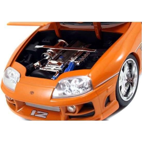 Fast & Furious: 1995 Toyota Supra with Figure Brian with Light-Up Function Diecast Model 1/18